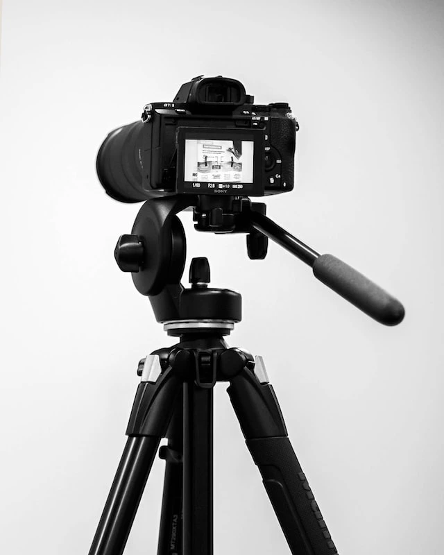 Photography camera on a tripod.